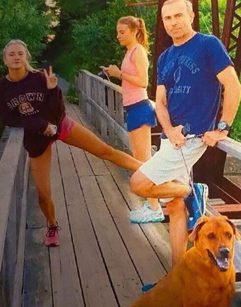 Jim Hoffer with his daughters, Emilie Hoffer and Carlie Hoffer, and dog.